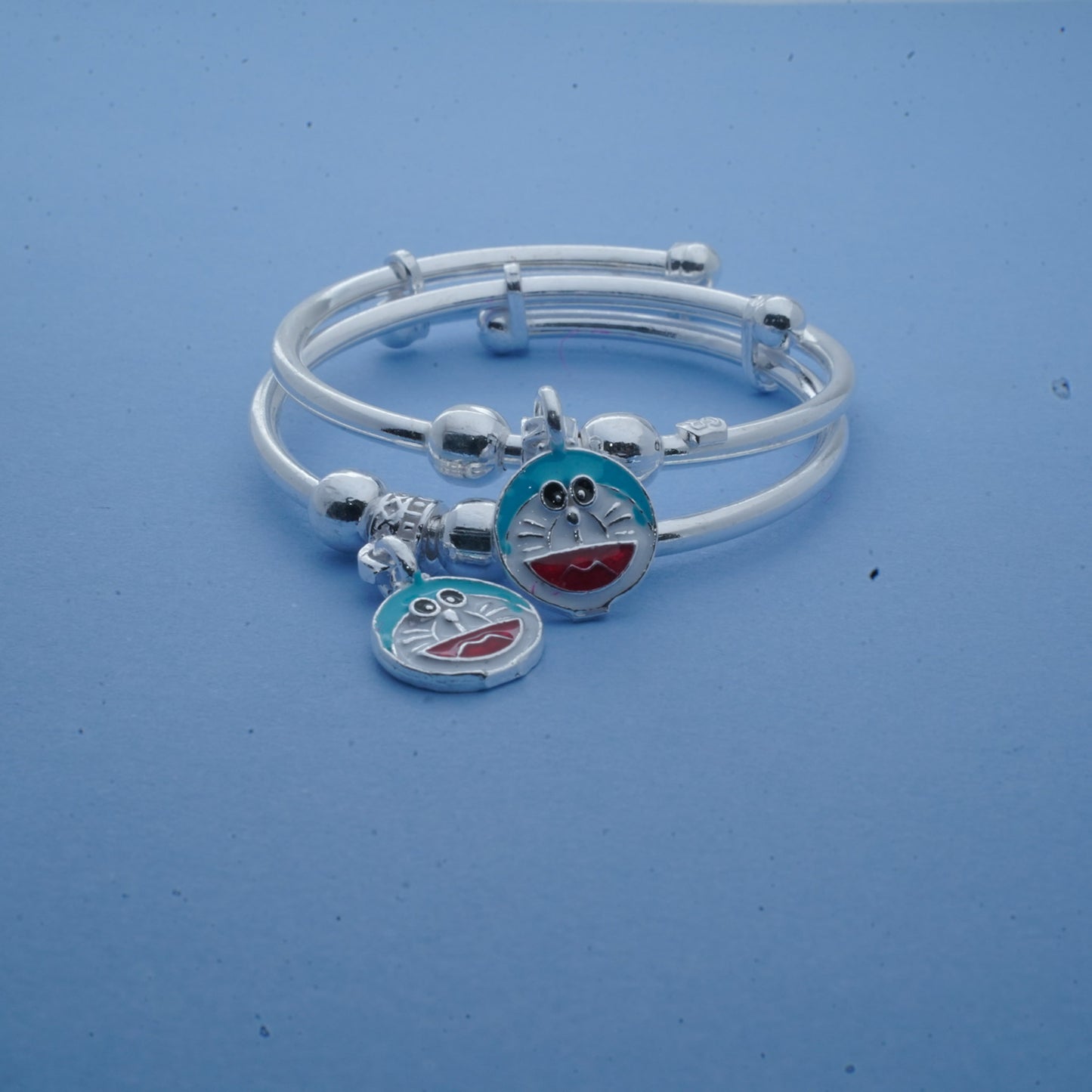 adjustable silver kids' bracelets with doraemon charm - pair of two