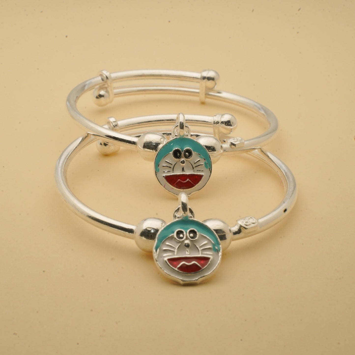 adjustable silver kids' bracelets with doraemon charm - pair of two