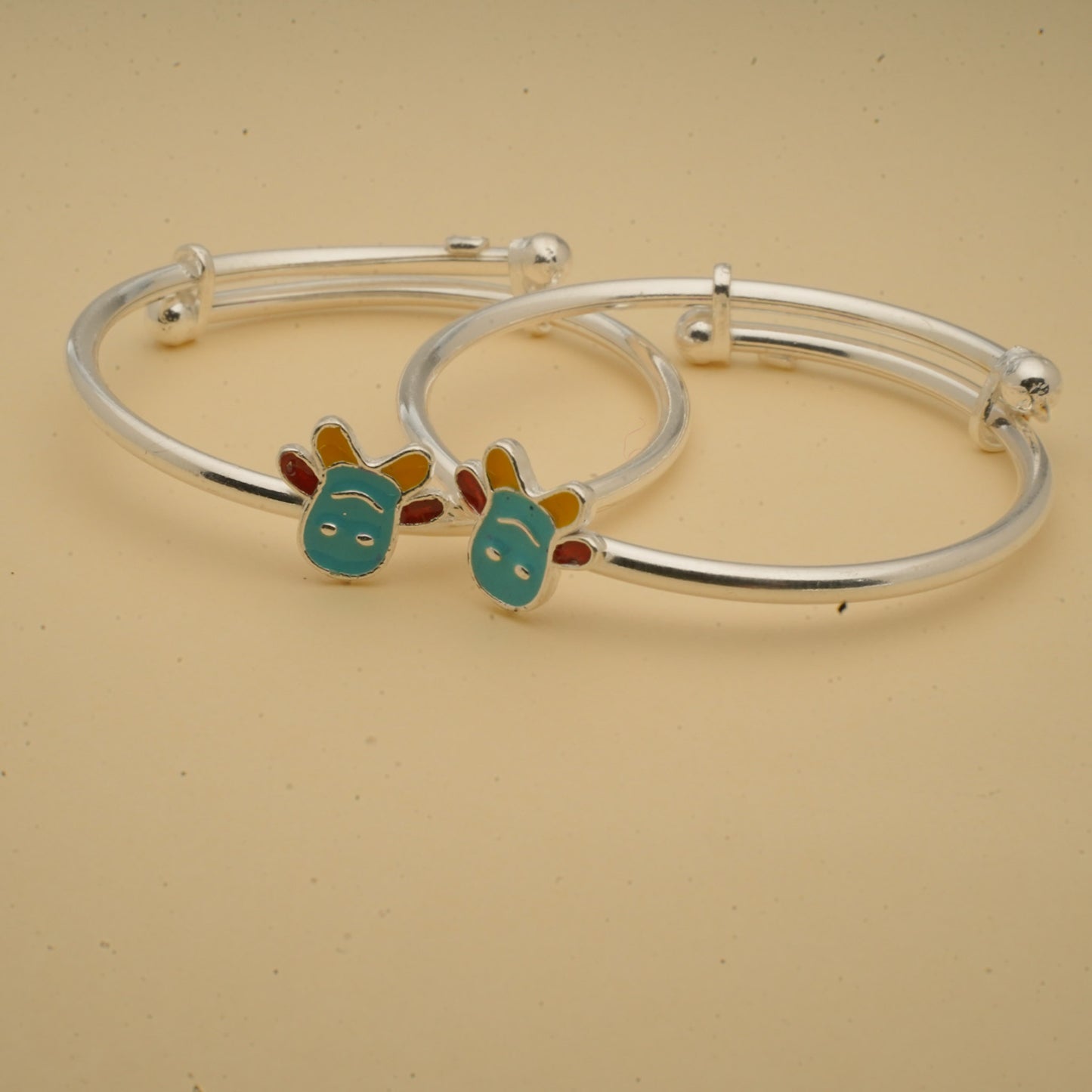 silver kada pair for kids with colorful teddy design