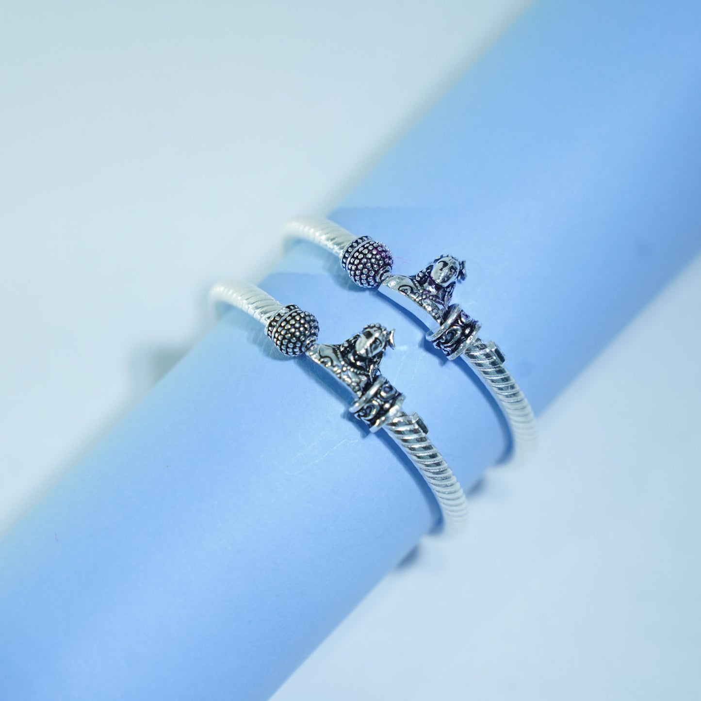 silver kada pair for kids with mahadev name, black polish, damaru, and rudraksh