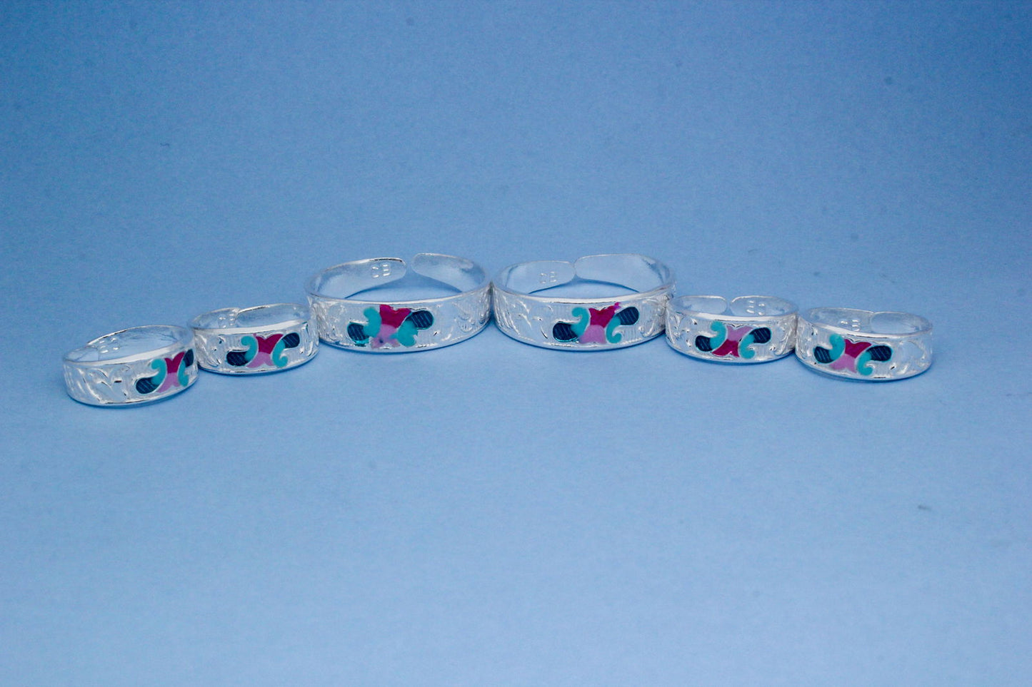 colorful silver toe ring set with intricate design | shyni - shyni jewellery
