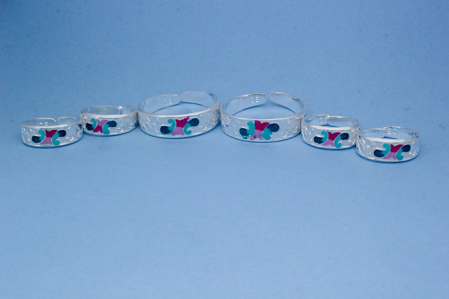 colorful silver toe ring set with intricate design | shyni - shyni jewellery