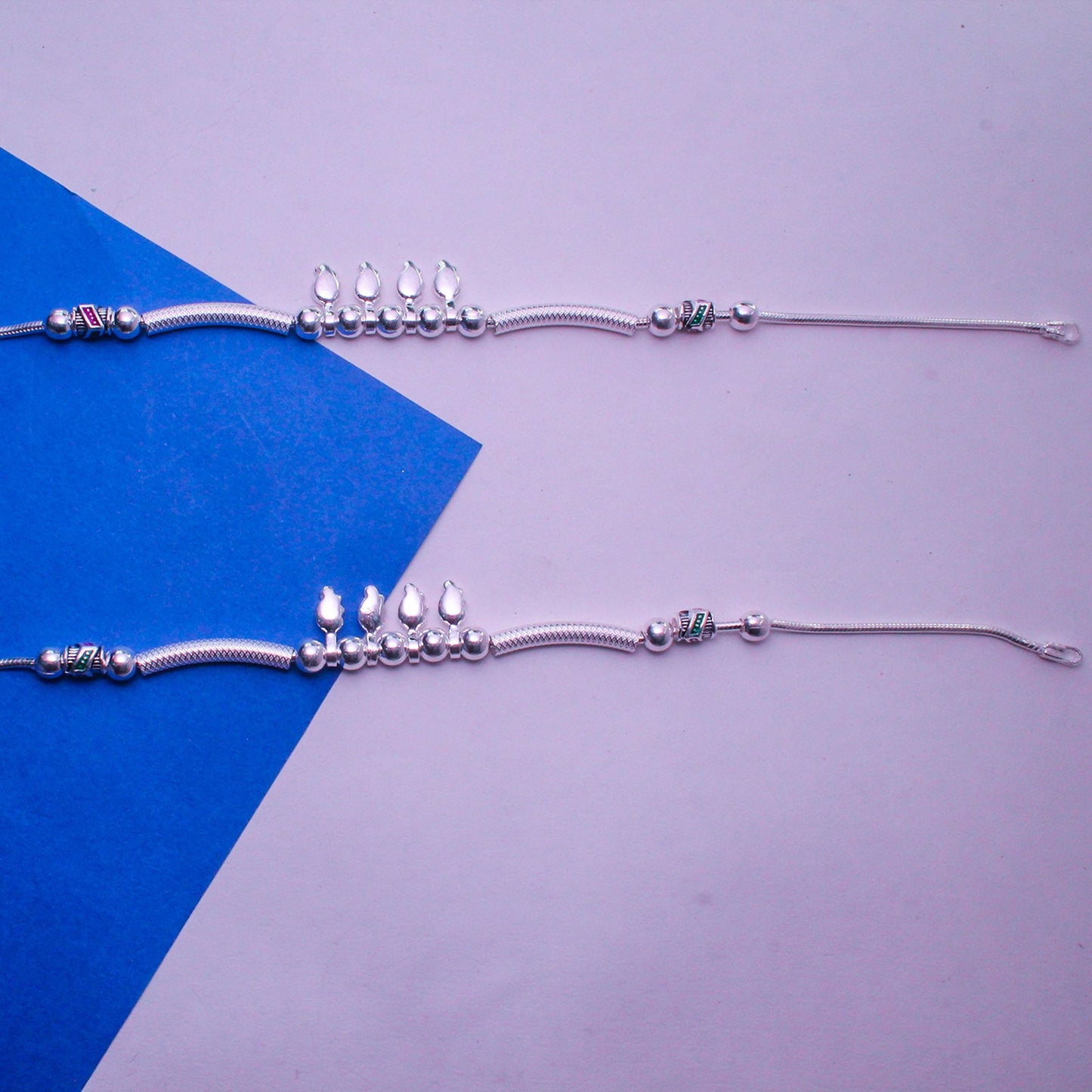 elegant silver payal with delicate hanging charms | shyni - shyni jewellery