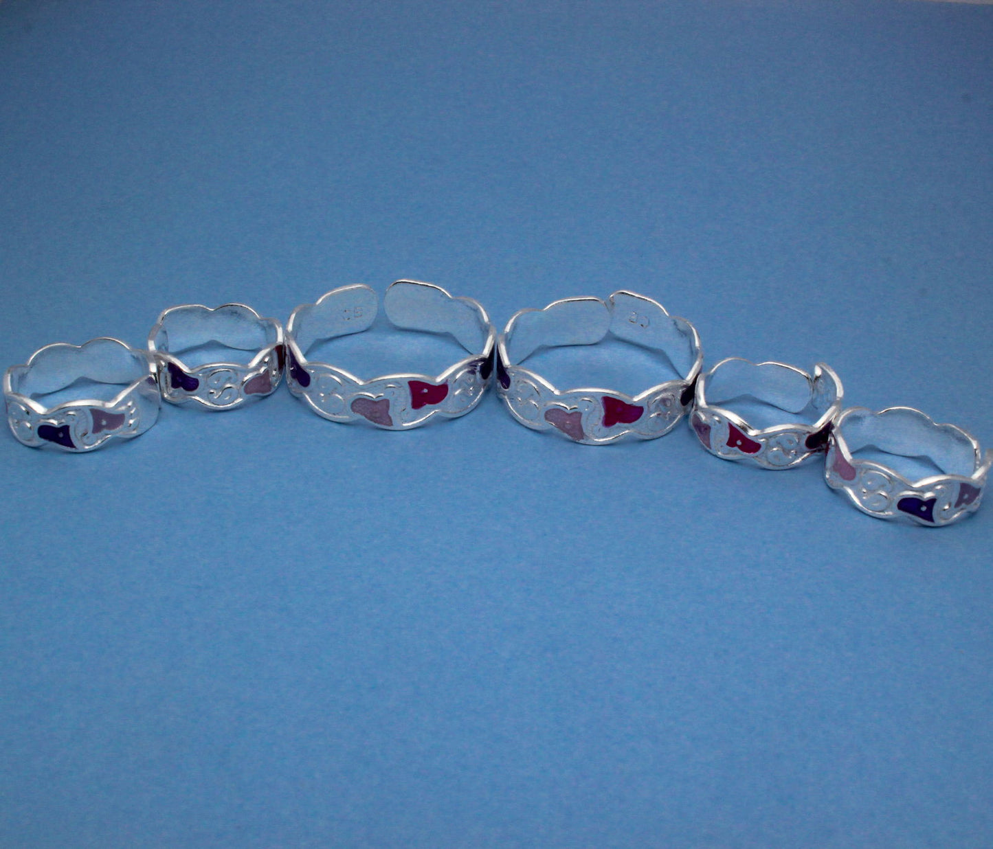 simple silver toe ring set with triangular pink & purple accents | shyni - shyni jewellery
