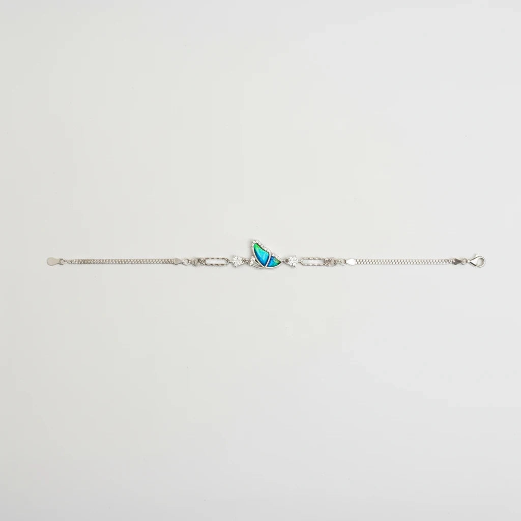 shyni jewelry girlish bee bracelet featuring a blue iridescent wing charm with sparkling stones on a silver chain