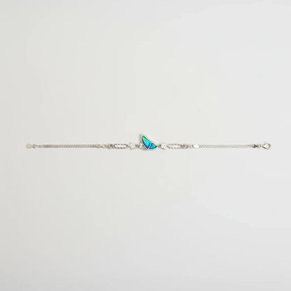 Shyni Jewelry Girlish Bee bracelet featuring a blue iridescent wing charm with sparkling stones on a silver chain