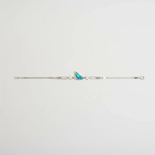 Shyni Jewelry Girlish Bee bracelet featuring a blue iridescent wing charm with sparkling stones on a silver chain