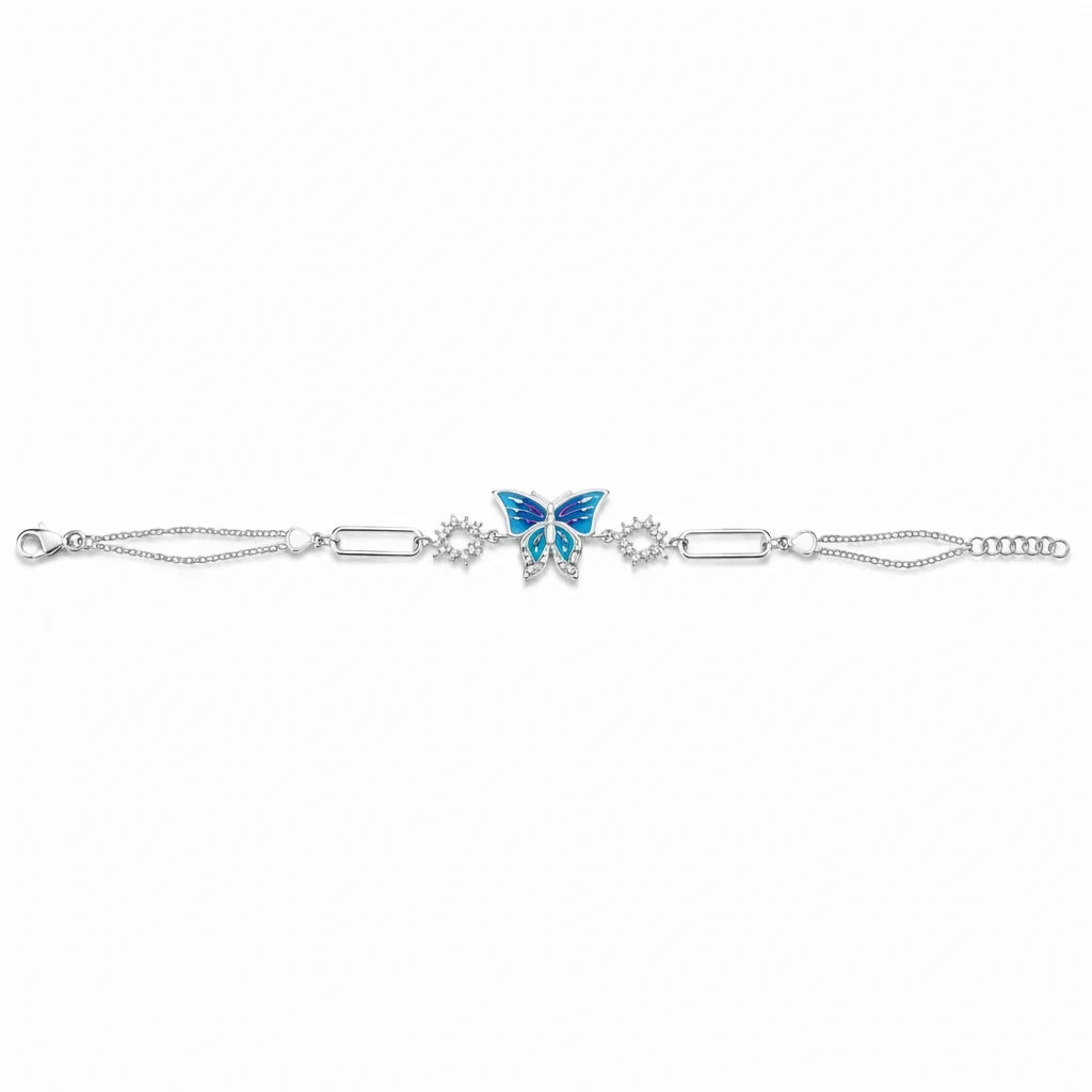 Shyni Jewelry butterfly bracelet featuring a blue enamel butterfly charm on a silver chain with delicate crystal accents
