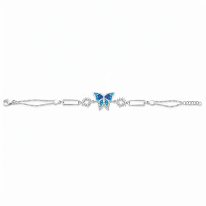 Shyni Jewelry butterfly bracelet featuring a blue enamel butterfly charm on a silver chain with delicate crystal accents