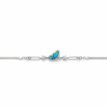 Shyni Jewelry silver butterfly bracelet with a color-changing mood stone and sparkling cubic zirconia accents.