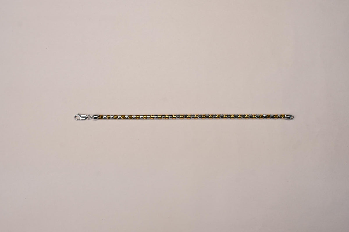 Shyni Jewelry men's two-tone Italian bracelet featuring alternating gold and silver polished metal links.