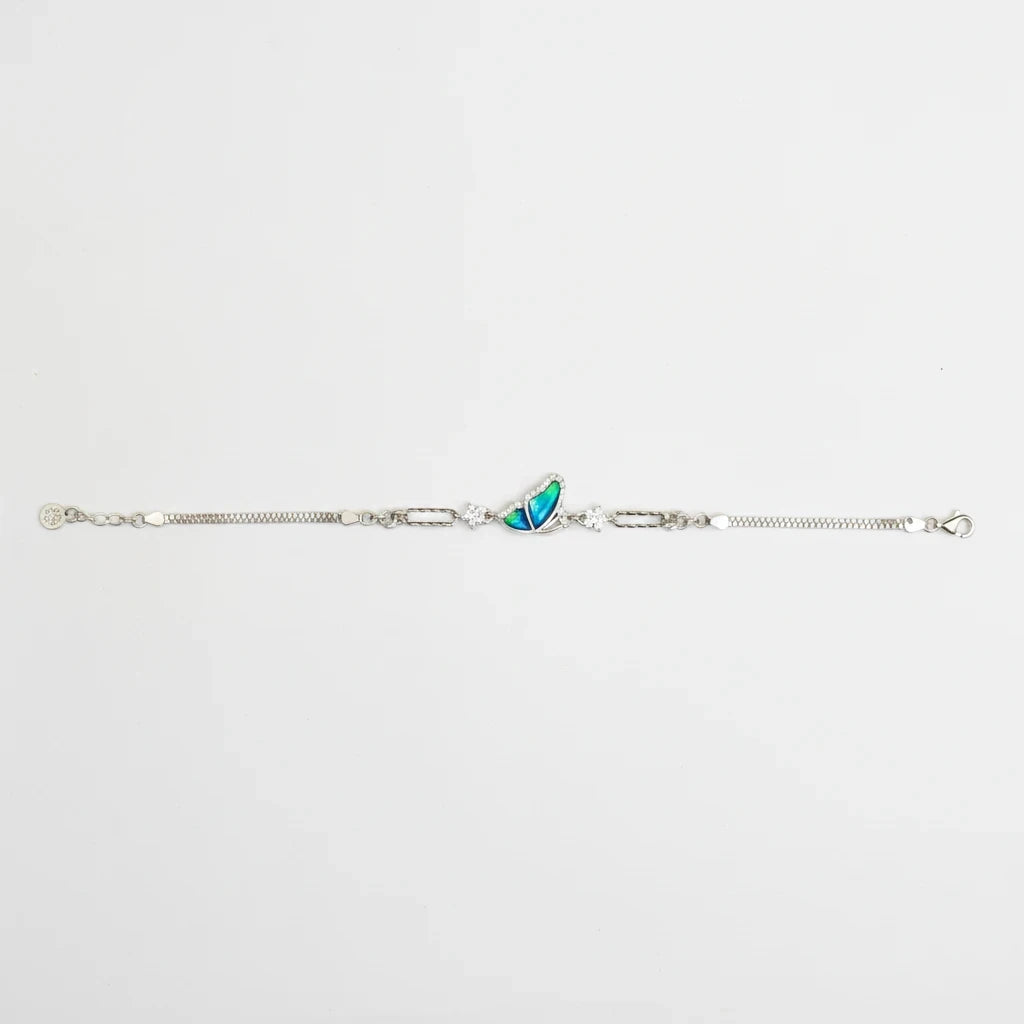 Shyni Jewelry silver bracelet featuring a delicate bee charm with iridescent green and blue wings and crystal accents