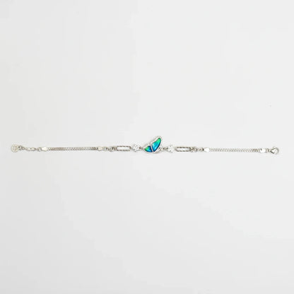 Shyni Jewelry silver bracelet featuring a delicate bee charm with iridescent green and blue wings and crystal accents