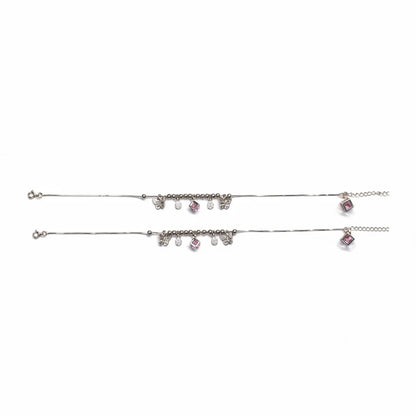 Shyni Jewelry silver charm anklet set featuring delicate butterfly charms and pink crystal accents on a thin chain.