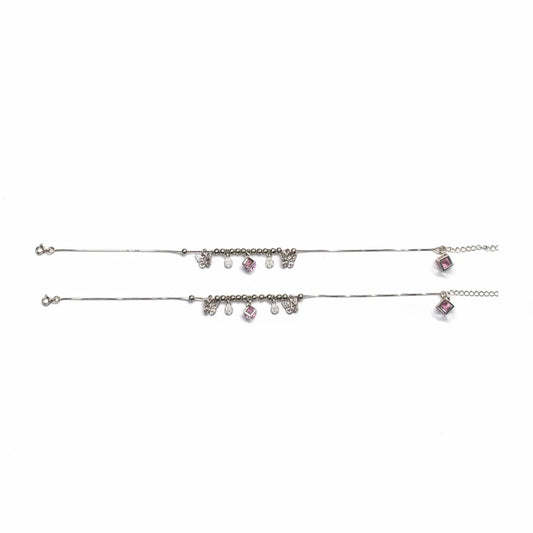 Shyni Jewelry silver charm anklet set featuring delicate butterfly charms and pink crystal accents on a thin chain.