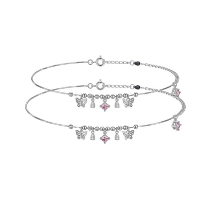 Shyni Jewelry silver charm anklet featuring delicate butterfly charms, pink square crystals, and small bead accents.