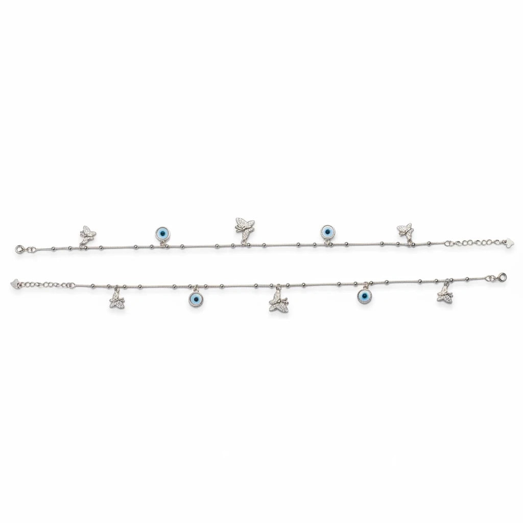 Shyni Jewelry silver anklet set featuring delicate butterfly charms and blue evil eye beads on a thin chain