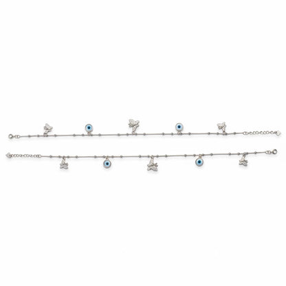 Shyni Jewelry silver anklet set featuring delicate butterfly charms and blue evil eye beads on a thin chain