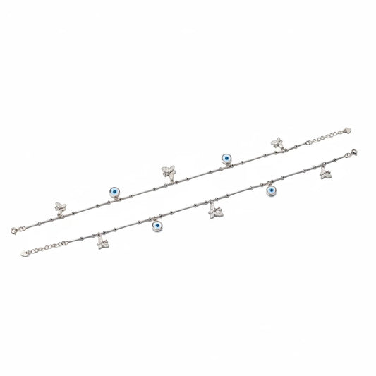 Shyni Jewelry silver anklet featuring delicate butterfly charms and blue evil eye beads on a thin chain
