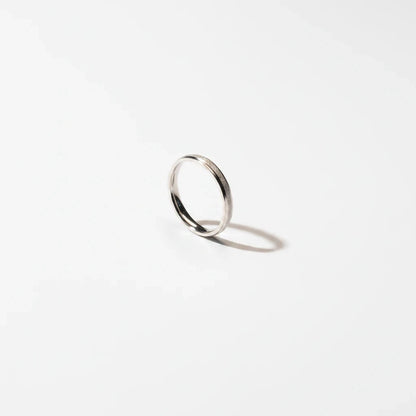 Shyni Jewelry 925 sterling silver band ring for women featuring a delicate precision-cut textured finish.