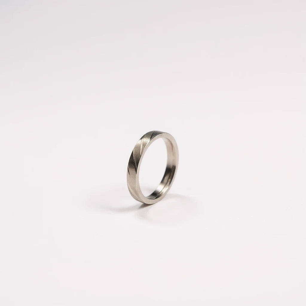 Shyni Jewelry 925 sterling silver band ring for men featuring a polished finish and detailed engraved cutting pattern.
