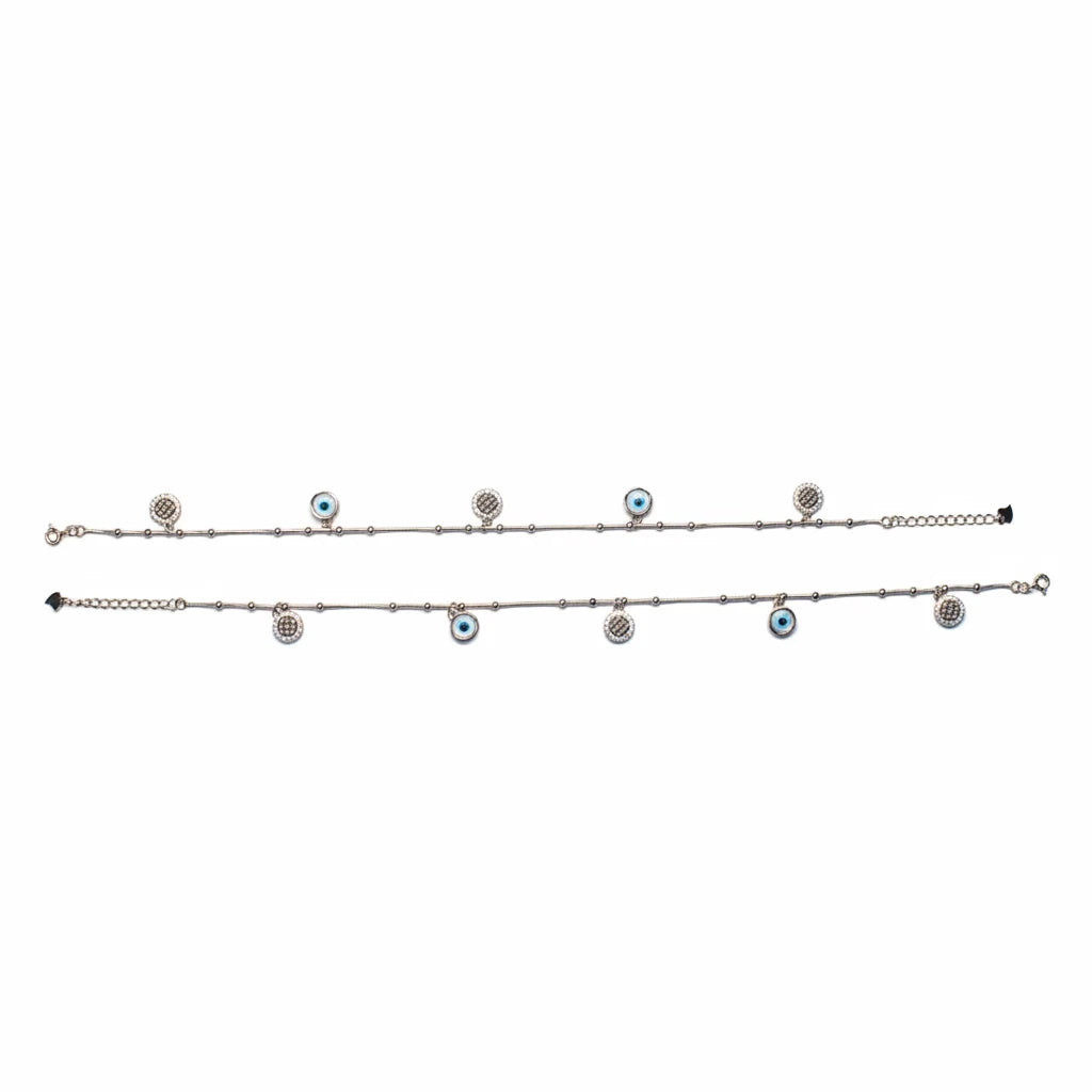 shyni jewelry silver anklet set featuring delicate chains with alternating evil eye and crystal-studded charms