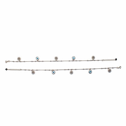 Shyni Jewelry silver anklet set featuring delicate chains with alternating evil eye and crystal-studded charms