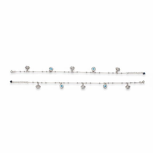 Shyni Jewelry silver anklet featuring alternating evil eye charms and small crown pendants on a delicate chain
