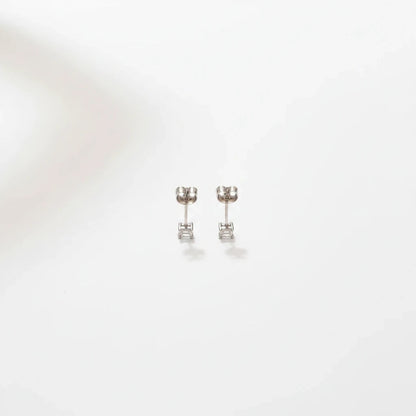 Shyni Jewelry square-shaped silver stud earrings with clear stones on a clean white background