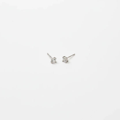 Shyni Jewelry square-cut clear stud earrings in a minimalist silver setting on a clean white background.