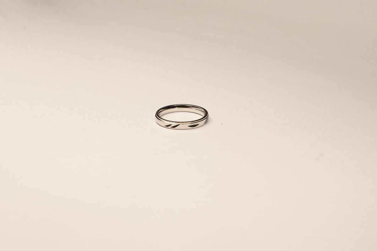 Shyni Jewelry 925 sterling silver band ring for men featuring a polished finish and subtle beveled edge detailing.