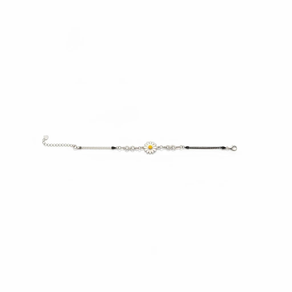 Shyni Jewelry silver chain bracelet featuring a white and yellow enamel sunflower charm and infinity link detail