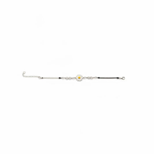 Shyni Jewelry silver chain bracelet featuring a white and yellow enamel sunflower charm and infinity link detail