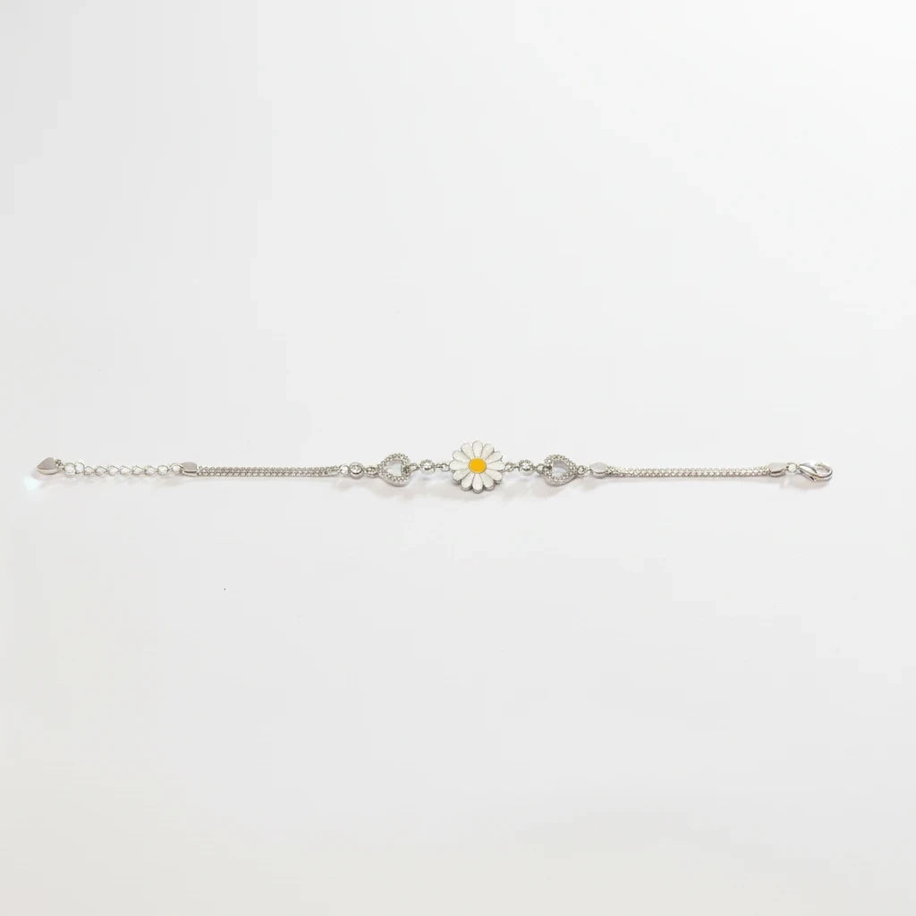 shyni jewelry silver chain bracelet featuring a white and yellow enamel sunflower charm and heart accents.