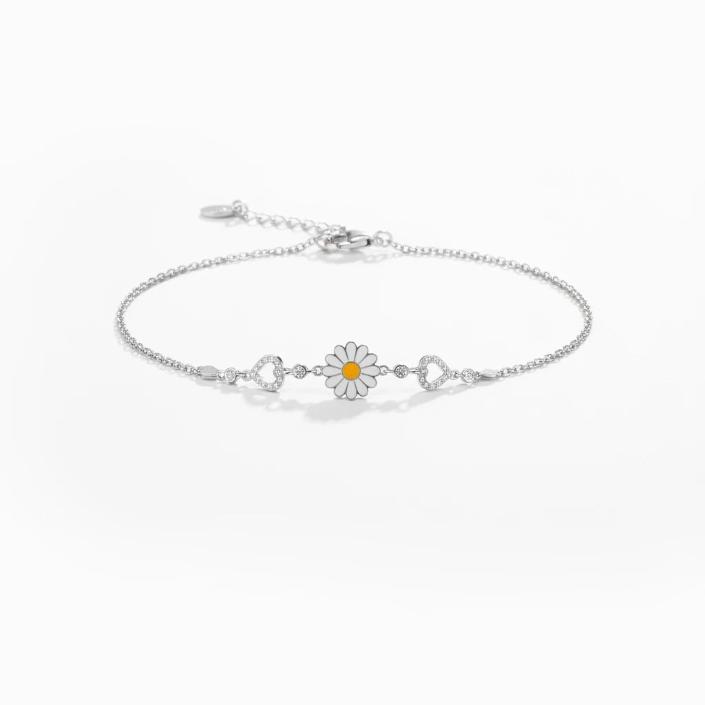 shyni jewelry silver chain bracelet featuring a white enamel sunflower charm and heart accents with sparkling stones.