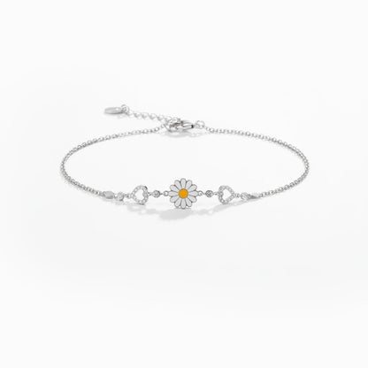 Shyni Jewelry silver chain bracelet featuring a white enamel sunflower charm and heart accents with sparkling stones.
