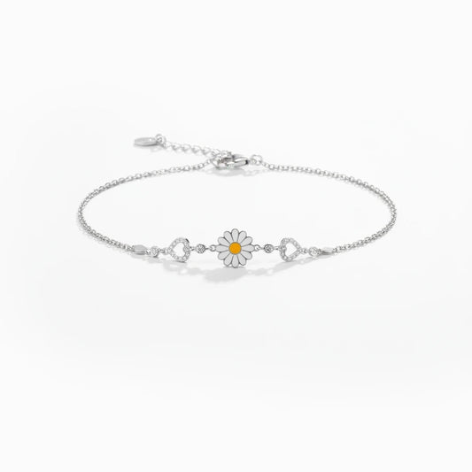 Shyni Jewelry silver chain bracelet featuring a white enamel sunflower charm and heart accents with sparkling stones.
