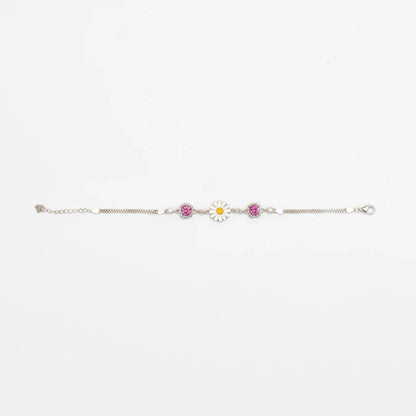 Shyni Jewelry sunflower enamel bracelet featuring pink stones and a delicate silver chain on a white background