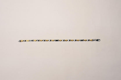 Shyni Jewelry two-tone textured link bracelet featuring alternating gold and silver-toned geometric metal links.