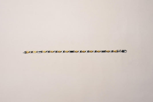 Shyni Jewelry two-tone textured link bracelet featuring alternating gold and silver-toned geometric metal links.