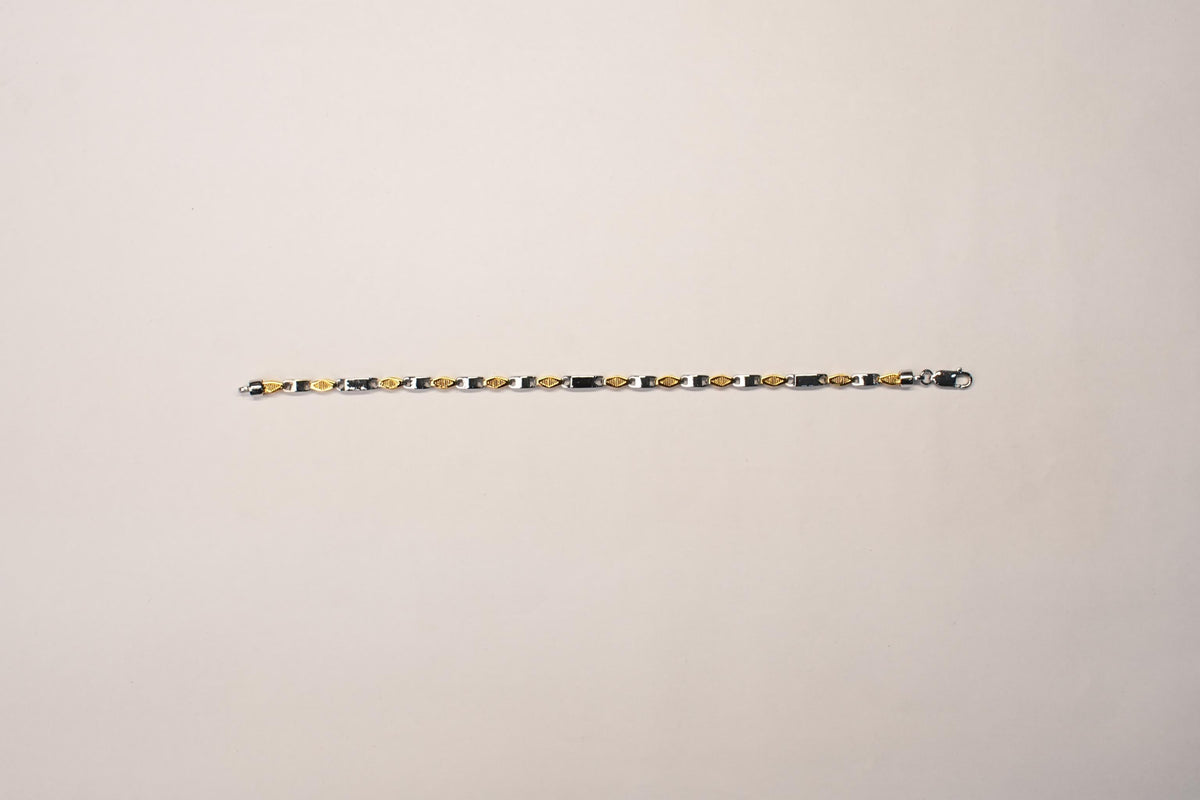 shyni jewelry two-tone textured link bracelet featuring alternating gold and silver-toned polished metal segments.