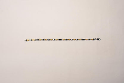 Shyni Jewelry two-tone textured link bracelet featuring alternating gold and silver-toned polished metal segments.