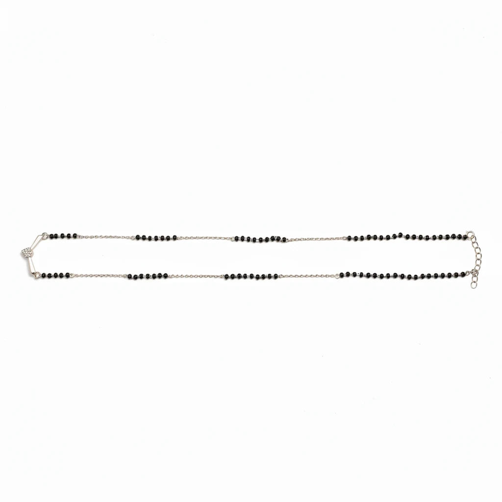 Shyni Jewelry V-shape mangalsutra pendant with a sparkling stone on a traditional black bead mala chain