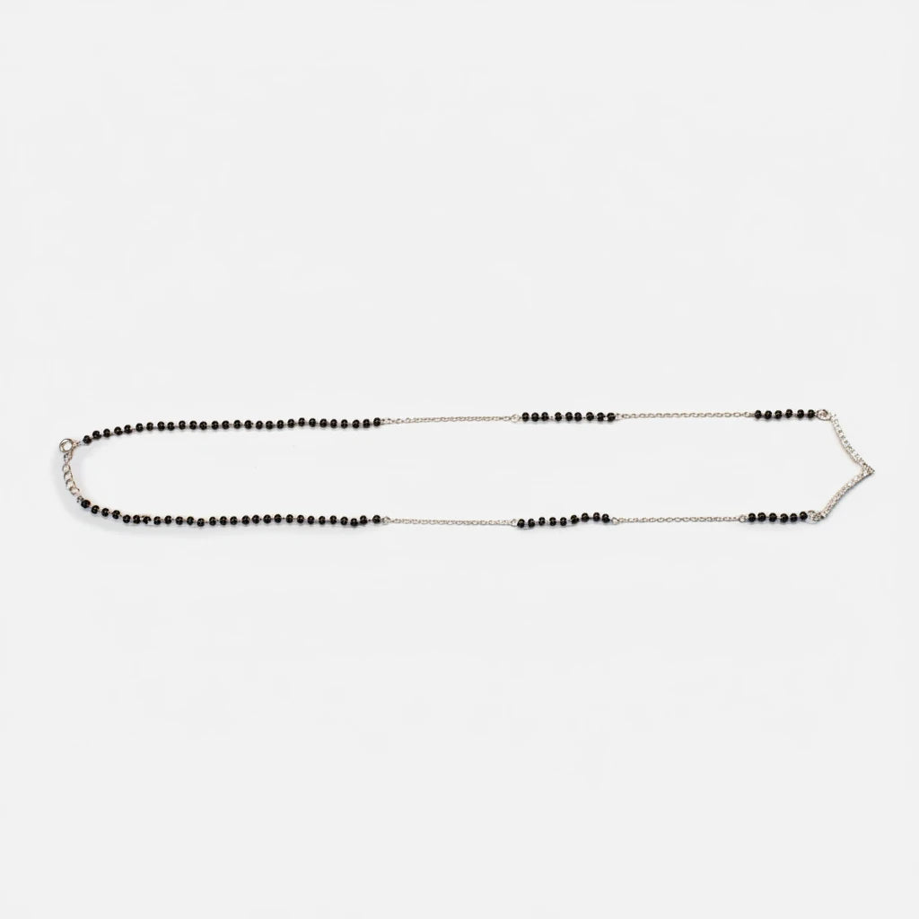 shyni jewelry 925 sterling silver v-shape mangalsutra with delicate black faceted beads on a fine silver chain.